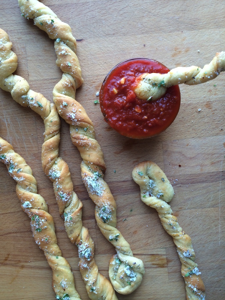 Garlic Herb Bread Twists with Parmesan Cheese and Easy Marinara Dipping Sauce